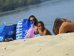 Hidden cams at the beach get two sexy naked Latina babes