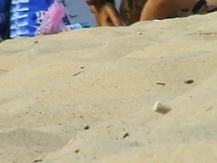 Hidden cams at the beach get two sexy naked Latina babes