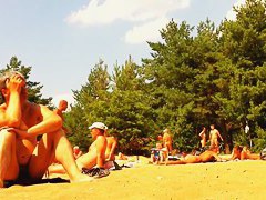 Naked bodies at private nudist beach