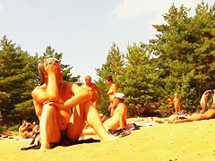 Naked bodies at private nudist beach