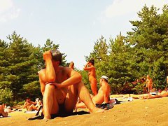 Naked bodies at private nudist beach