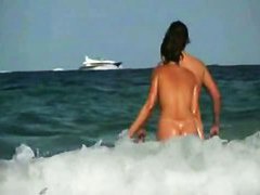 Nude 10 with wet shaking boobies and perfect ass in porno on the beach.