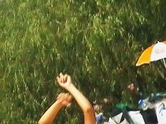 A luscious woman sunbathing in this nude beach voyeur video