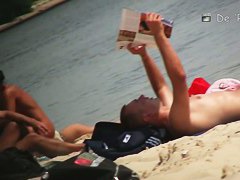 Another full of people nude beach with many babes to watch