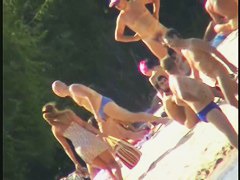 Nude spy cam on the beach with a black hair goddess in focus