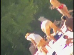 Nude spy cam on the beach with a black hair goddess in focus