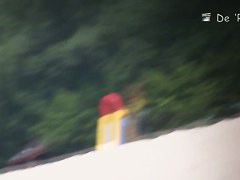 Naked hotties followed around by a nude beach voyeur