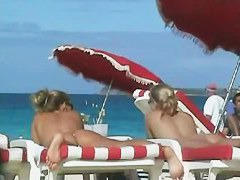 Beach voyeur movies present hot naked bodies basking in the sun.