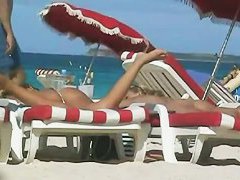 Beach voyeur movies present hot naked bodies basking in the sun.