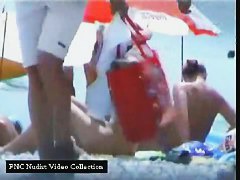 Horny voyeur loves to spy on nude people on the beach.