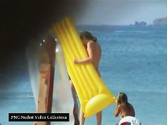 Hot pointy tits and a girl with a shaved head in this beach video