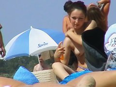 Superb beach voyeur close up shots of nude girls
