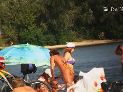 A nude beach voyeur films a funny girl with a pineapple painted on her ass