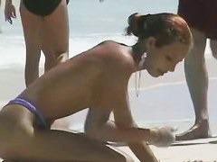 Candid beach camera is capturing hot tanned boobies