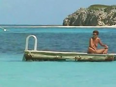 Candid beach camera is capturing hot tanned boobies