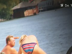 Beach nudist girls show asses and tits to the beach crowd