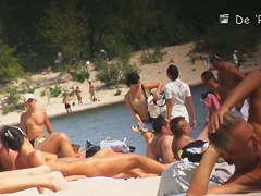 Beach nudist girls show asses and tits to the beach crowd