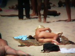 Blonde kinky girl is so sexy looking on this beach