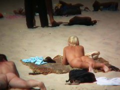 Blonde kinky girl is so sexy looking on this beach
