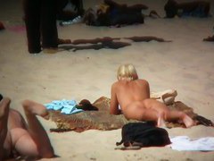 Blonde kinky girl is so sexy looking on this beach