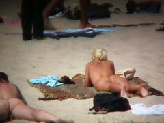 Blonde kinky girl is so sexy looking on this beach
