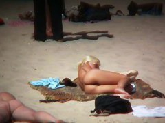 Blonde kinky girl is so sexy looking on this beach