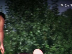 Nudist females in big hats topless on beach voyeur cam