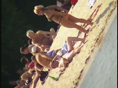 Naked tourists caught on beach spy cam relaxing and enjoying nudity