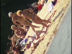 Naked tourists caught on beach spy cam relaxing and enjoying nudity