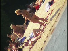 Naked tourists caught on beach spy cam relaxing and enjoying nudity