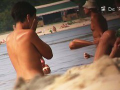 Voyeur nudist beach video with sexy blonde