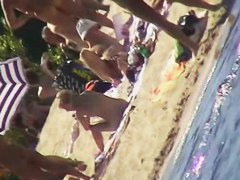Hot naked red hair chick on nude beach spy camera
