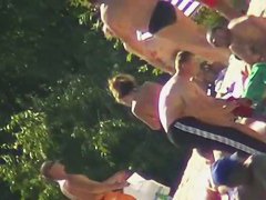 Hot naked red hair chick on nude beach spy camera