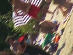 Hot naked red hair chick on nude beach spy camera