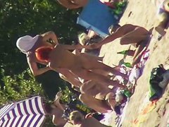 Hot naked red hair chick on nude beach spy camera