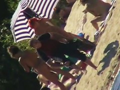 Hot naked red hair chick on nude beach spy camera