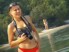 One topless and one pantieless babe on beach spy cam