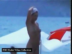 Hidden beach camera video of two sexy mature nudist women