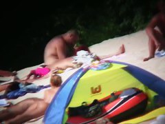 My own beach voyeur video of nude hot girls sunbathing