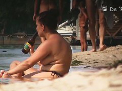 Nude beach voyeur camera shot of sexy well endowed people