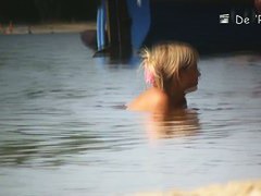 Nude beach voyeur camera shot of sexy well endowed people