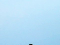 Topless sleek hotties on the nude beach getting filmed by a voyeur