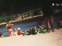 Beach voyeur spy cam catches hot footage of sexy naked girls.