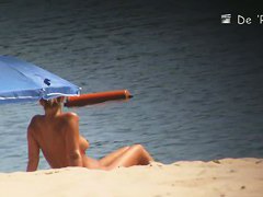 Beach voyeur spy cam catches hot footage of sexy naked girls.