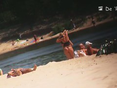 Beach voyeur spy cam catches hot footage of sexy naked girls.