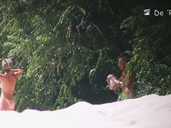 Mature bimbos get their panties in voyeur nudist beach video