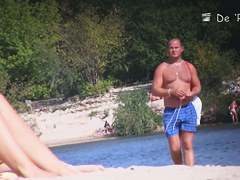 Exciting beach spycam blonde sunbathing without panty or bra