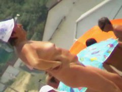 Slutty real nudist beach voyeur video