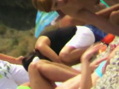 Slutty real nudist beach voyeur video