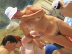 Slutty real nudist beach voyeur video
